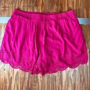 TORRID pink embroidered shorts.
